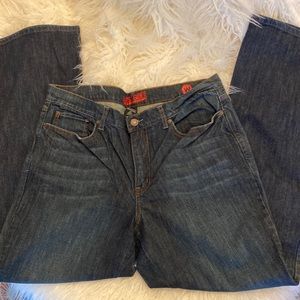 Dark heathered flared leg jeans by New York and company. Size 14